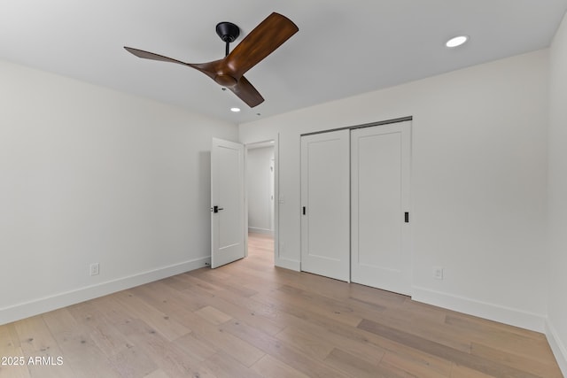 9611 E Clinton St, Scottsdale, AZ 85260 - unfurnished bedroom featuring light wood-type flooring, recessed lighting, baseboards, a closet, and ceiling fan