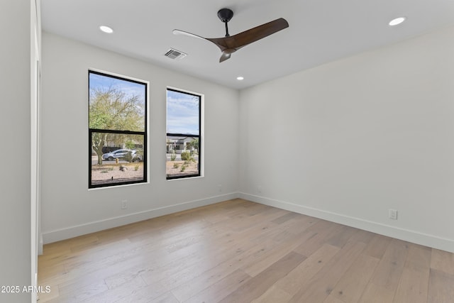 9611 E Clinton St, Scottsdale, AZ 85260 - unfurnished room with a ceiling fan, light wood finished floors, recessed lighting, and baseboards