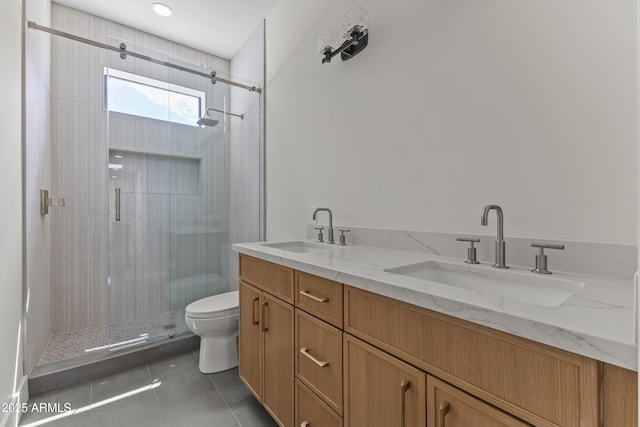 9611 E Clinton St, Scottsdale, AZ 85260 - bathroom with a stall shower, tile patterned flooring, toilet, and double vanity