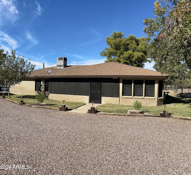 ranch-style house featuring central AC