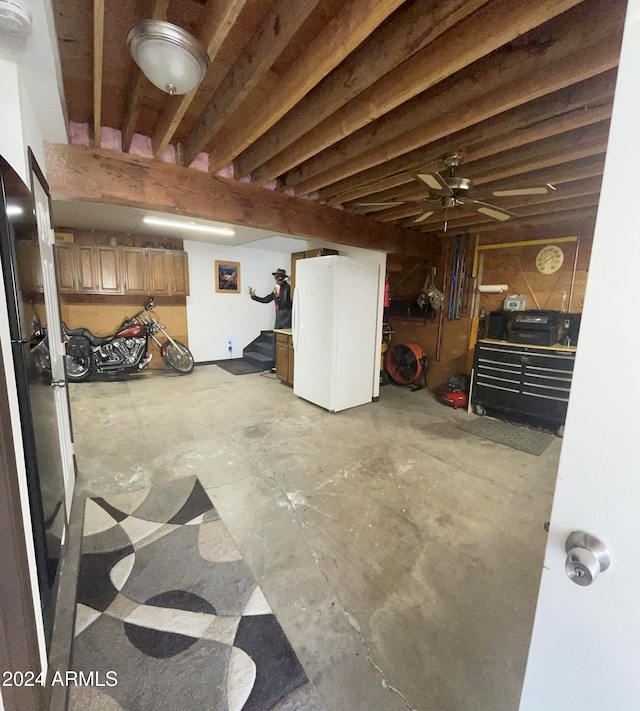 basement featuring ceiling fan