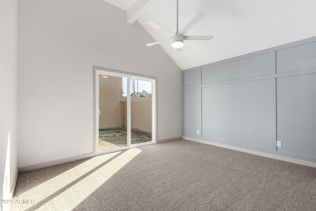 unfurnished bedroom with light colored carpet, beamed ceiling, access to outside, high vaulted ceiling, and a decorative wall