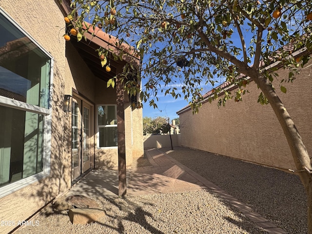 view of yard with a patio and fence