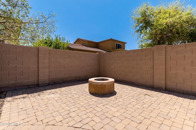 view of patio / terrace featuring a fire pit