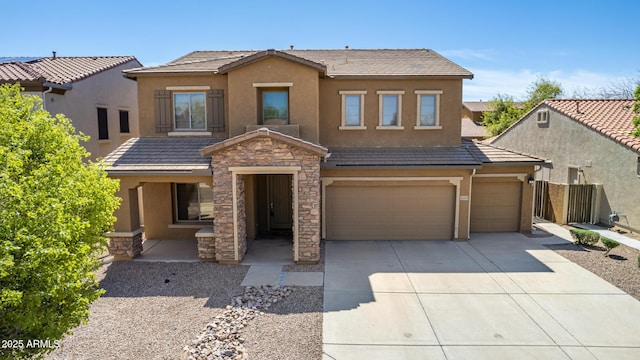 view of front of property with a garage