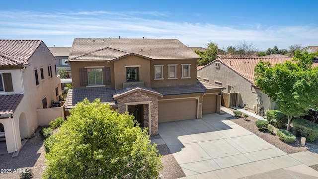 view of front of property with a garage