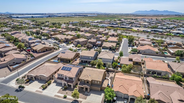 birds eye view of property featuring a mountain view