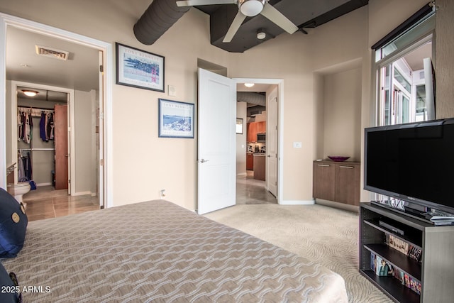 bedroom with light carpet and ceiling fan