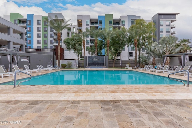 view of pool featuring a patio