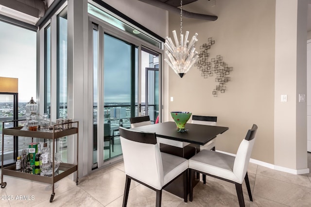 dining area featuring an inviting chandelier