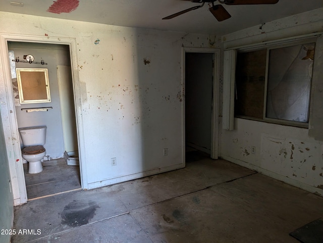 504 W Baseline Rd, Buckeye, AZ 85326 - unfurnished bedroom with concrete floors and connected bathroom