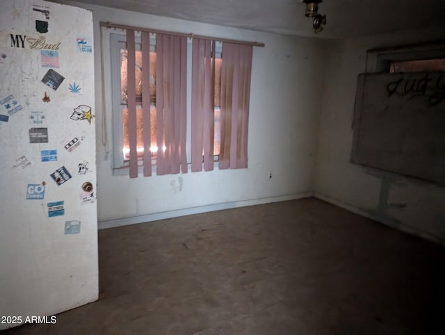 504 W Baseline Rd, Buckeye, AZ 85326 - empty room featuring baseboards