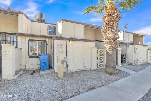 exterior space with stucco siding