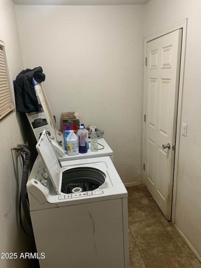 laundry area with washing machine and dryer