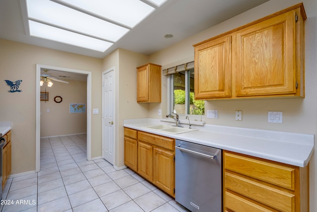 kitchen with light tile patterned flooring, ceiling fan, sink, and dishwasher