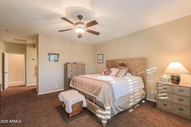 bedroom featuring ceiling fan, baseboards, and dark colored carpet