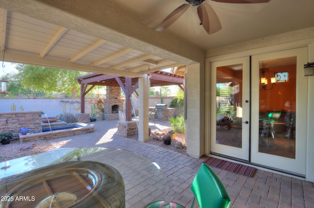 view of patio featuring a fenced backyard and ceiling fan