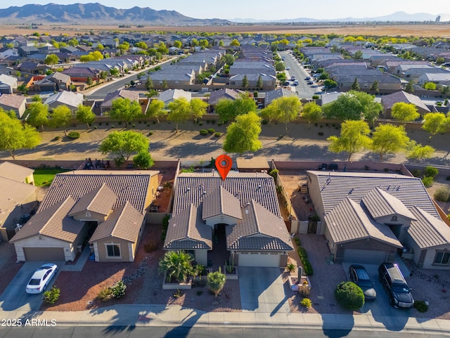 bird's eye view featuring a mountain view and a residential view