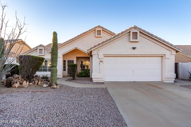 view of front of property featuring a garage