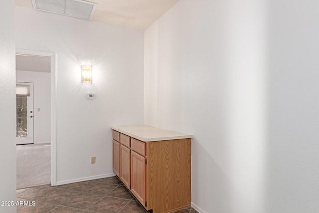 bathroom with tile patterned floors