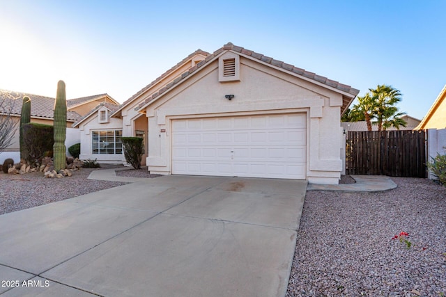 view of front of property with a garage