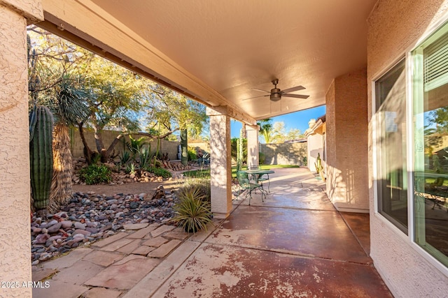 view of patio with ceiling fan