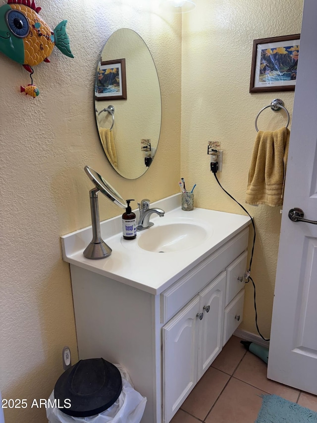 bathroom featuring tile patterned floors and vanity