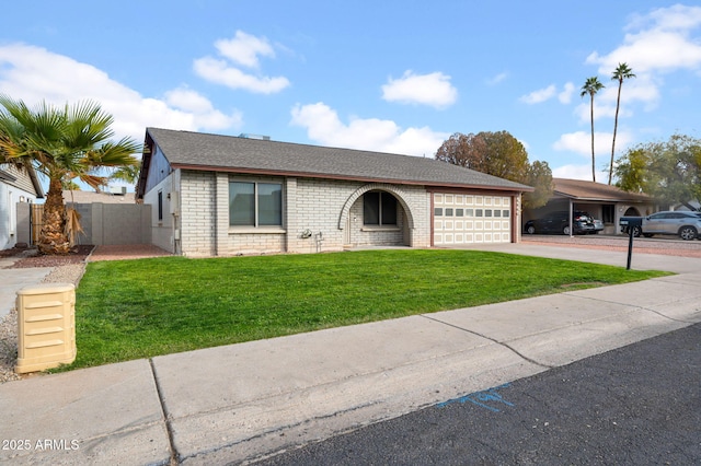 ranch-style home with a garage and a front lawn