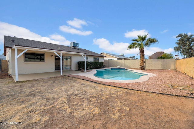 view of pool with a patio and central AC