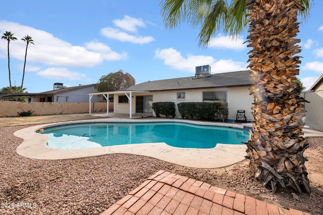 view of pool with a patio area and central air condition unit