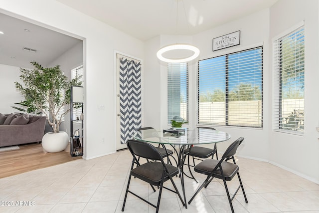 view of tiled dining space