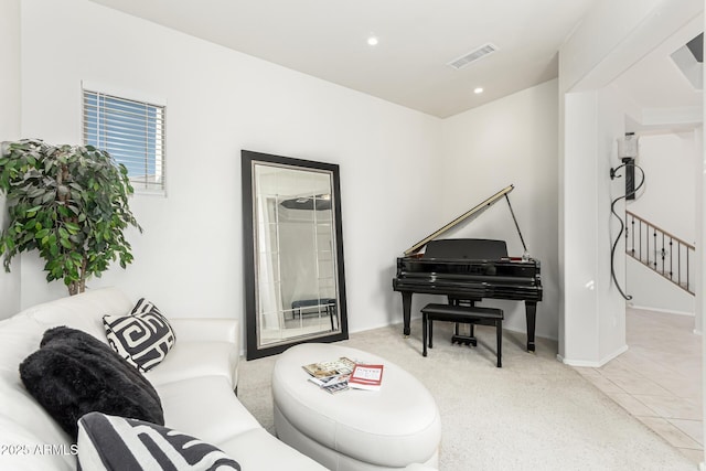 sitting room with tile patterned floors