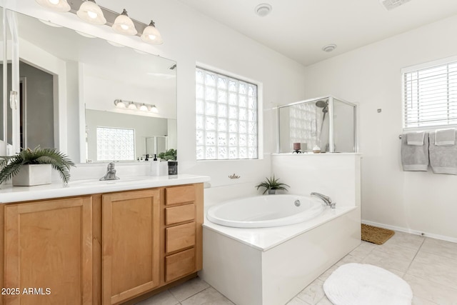 bathroom with vanity, separate shower and tub, and tile patterned floors