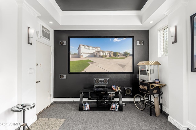 interior space with a tray ceiling, crown molding, and carpet