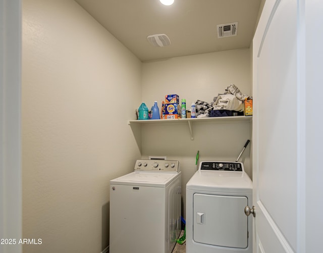 10856 E Primrose Ct, Florence, AZ 85132 - washroom featuring washing machine and dryer, visible vents, and laundry area