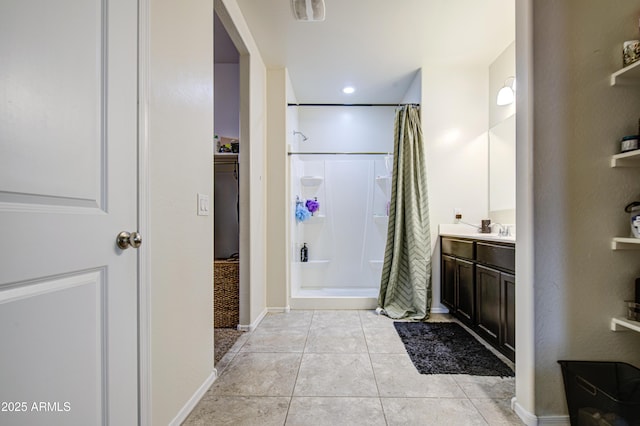 10856 E Primrose Ct, Florence, AZ 85132 - bathroom with tile patterned floors, a shower with curtain, baseboards, and vanity