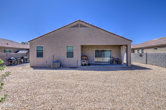 10856 E Primrose Ct, Florence, AZ 85132 - back of property featuring a patio area, a fenced backyard, central AC, and stucco siding