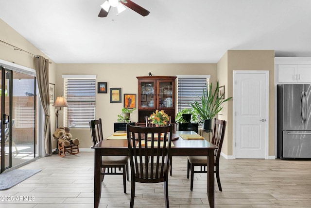 15391 W Yucatan Dr, Surprise, AZ 85379 - dining room with a ceiling fan and light wood-style flooring