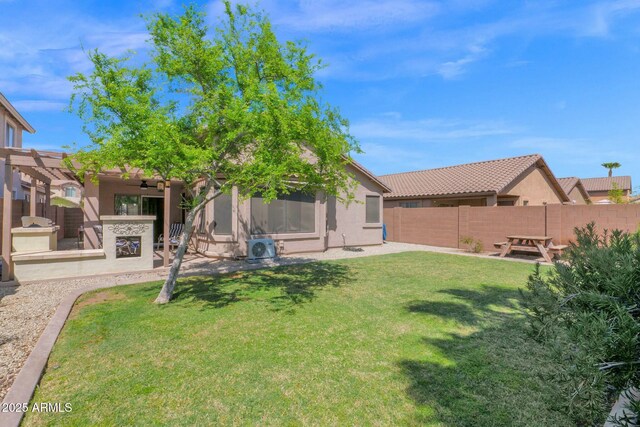 15391 W Yucatan Dr, Surprise, AZ 85379 - back of property with ceiling fan, stucco siding, a patio, and a pergola