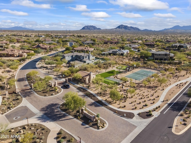 birds eye view of property featuring a mountain view