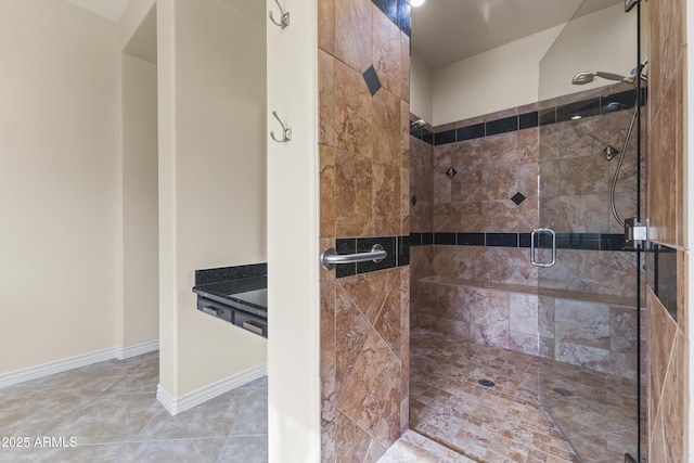 bathroom featuring tile patterned floors and walk in shower