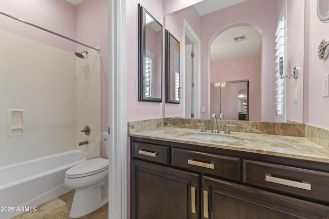 full bathroom featuring vanity, toilet, and shower / bathtub combination