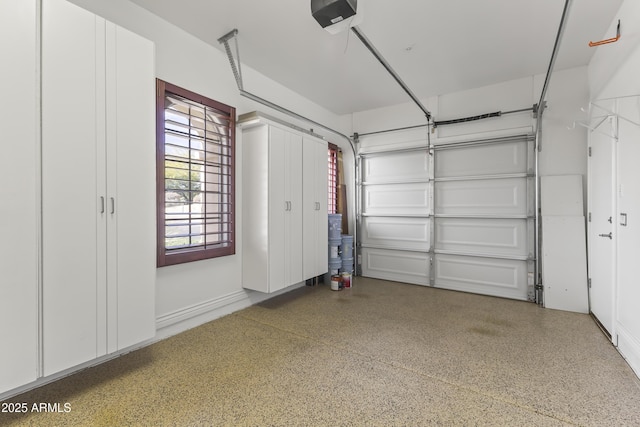 garage featuring a garage door opener