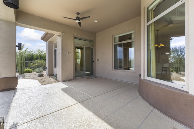 view of patio with ceiling fan