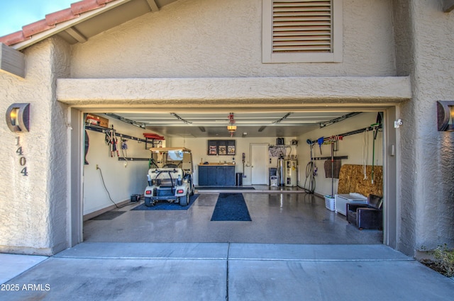 garage featuring water heater