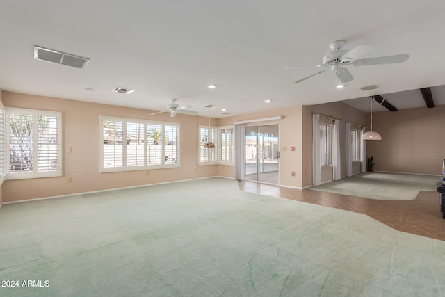 empty room featuring light colored carpet and ceiling fan