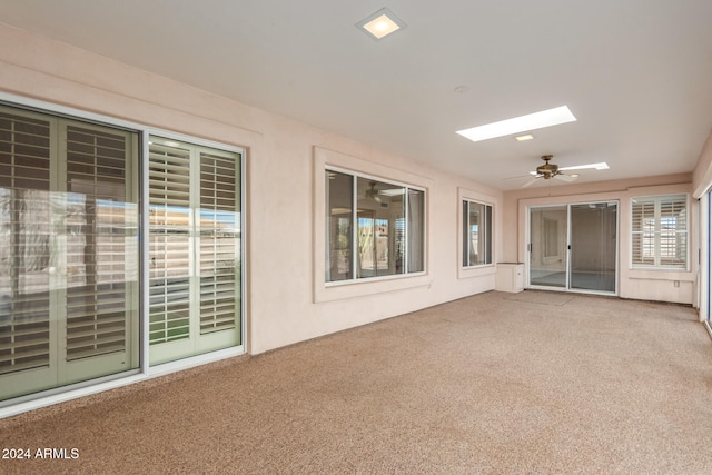 view of patio / terrace featuring ceiling fan