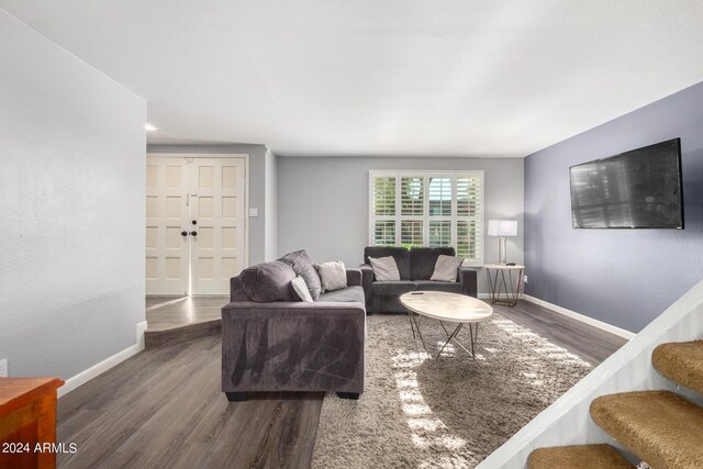 living room featuring dark hardwood / wood-style floors