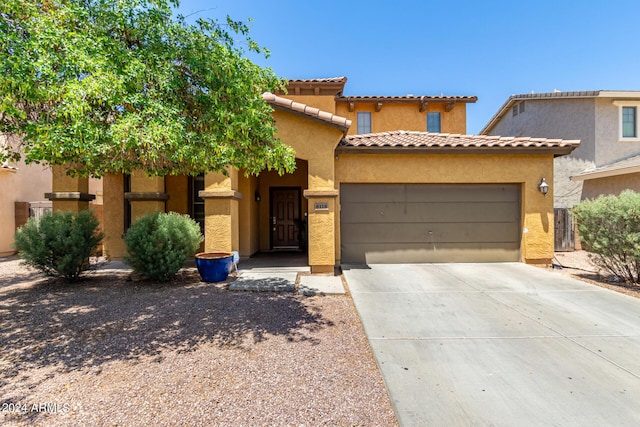 view of front of property featuring a garage