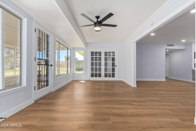 spare room featuring ceiling fan and light wood-type flooring